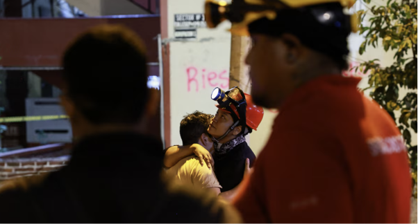 Race to reach trapped survivor offers hope in Colombia quake zone