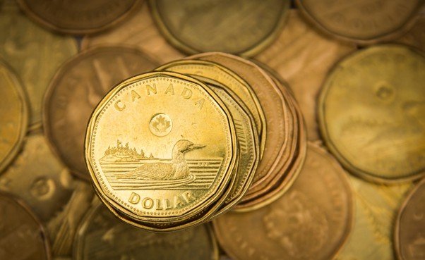 Canadian dollar hits 18-month low as jobs data clips rate hike bets